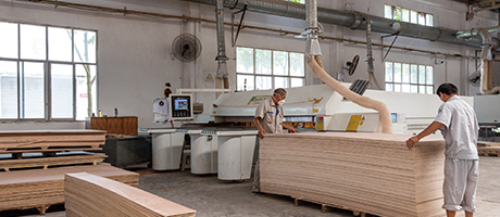 Custom hotel furniture factory with advanced production equipment and modern workshop environment